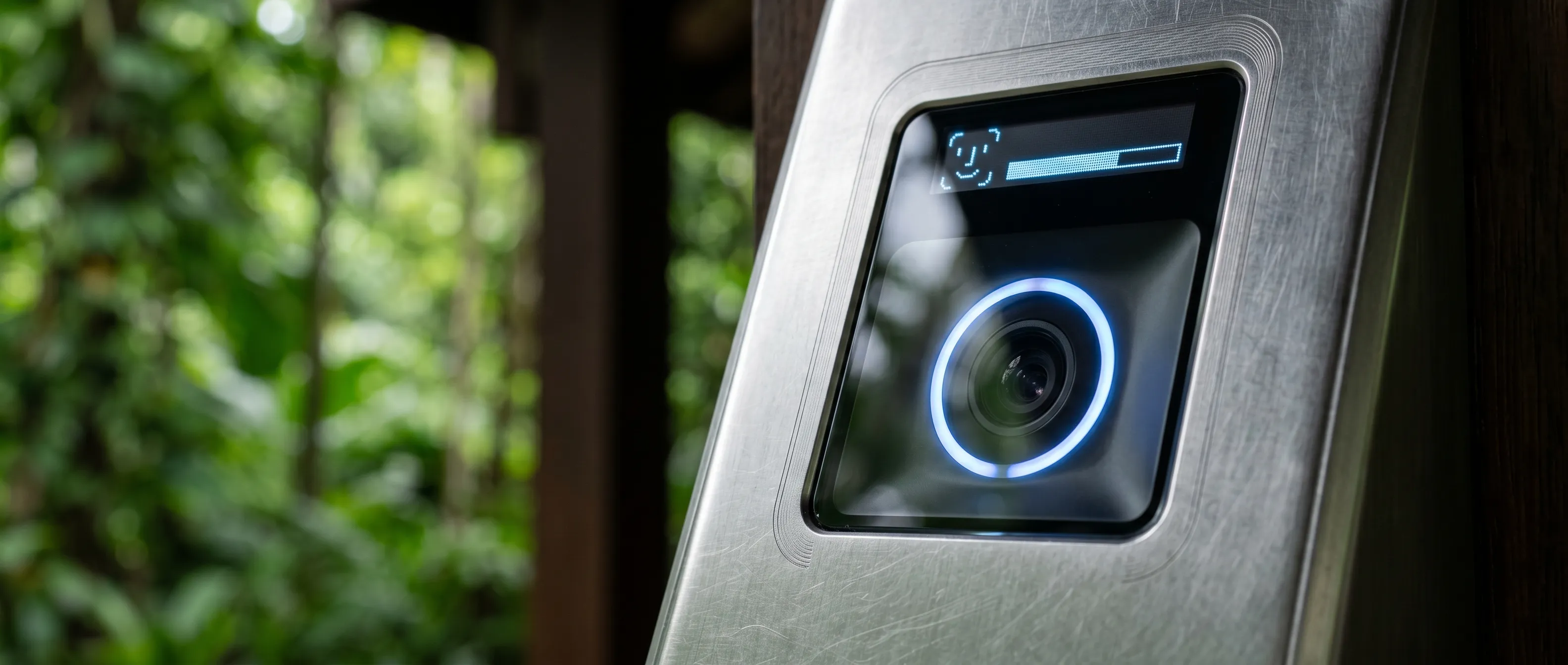 A biometric arrival terminal showing the 0ms friction check-in process