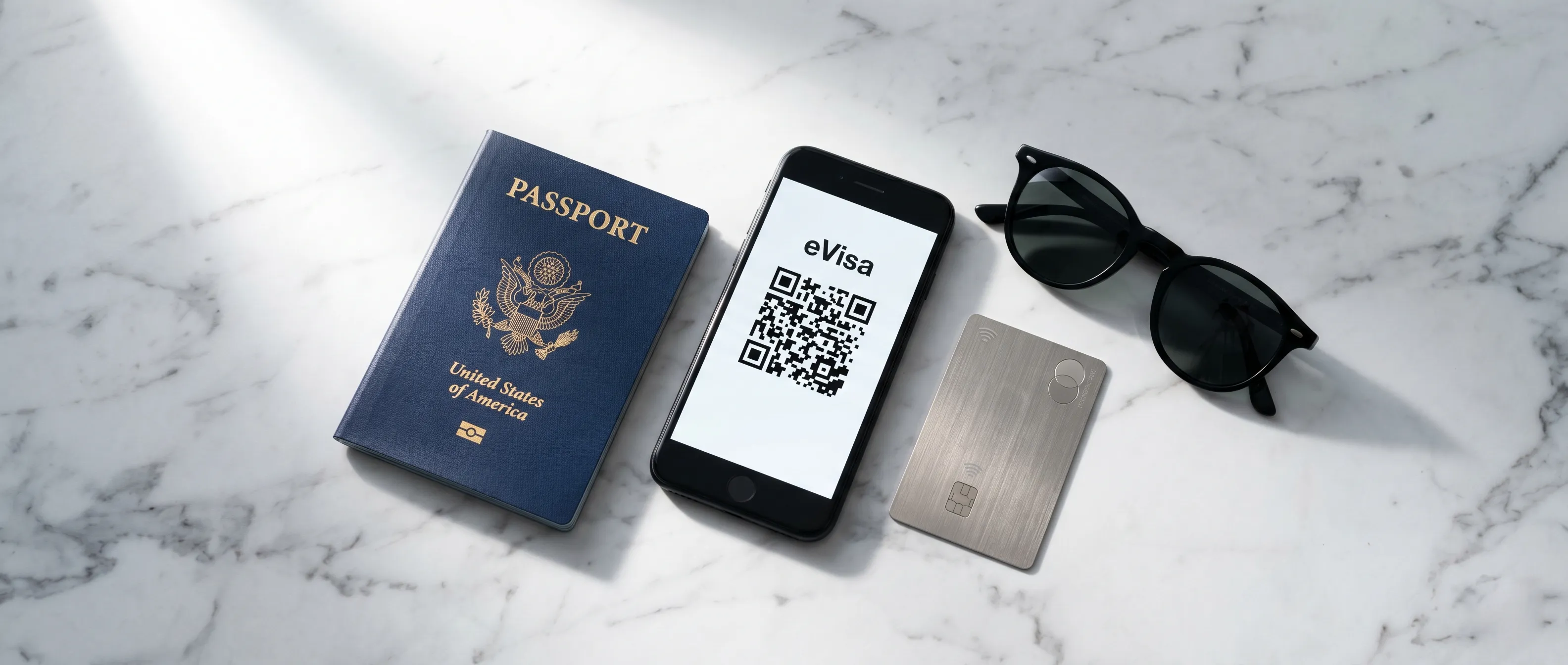 Modern travel essentials including a smartphone displaying a digital visa.