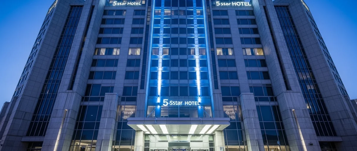 A grand 5-star hotel facade in an international city, illustrating how luxury can be affordable with the right budget hotel chains.